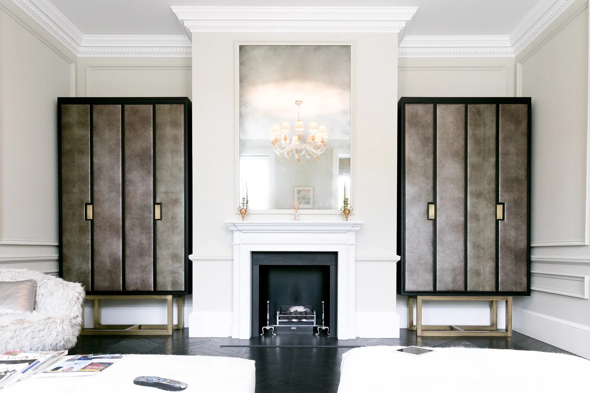 Pair of bespoke cabinets framing a fireplace in Putney Heath