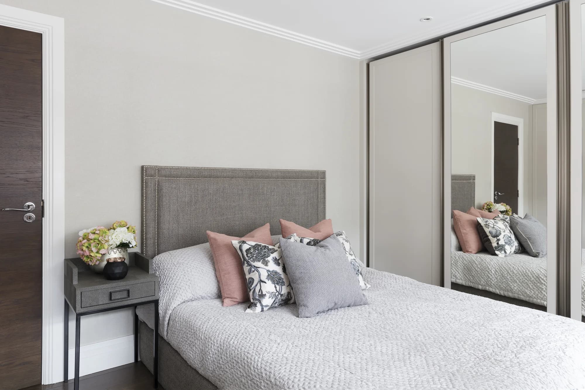 Front view of mirrored wardrobes